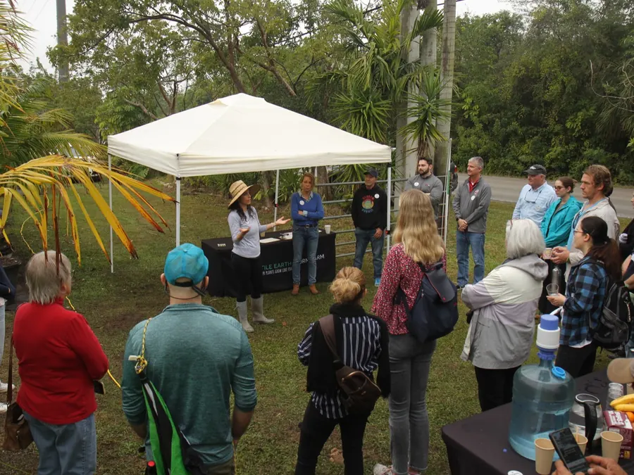 Visitors gathered at the Fertile Earth farm in Homestead for a tour