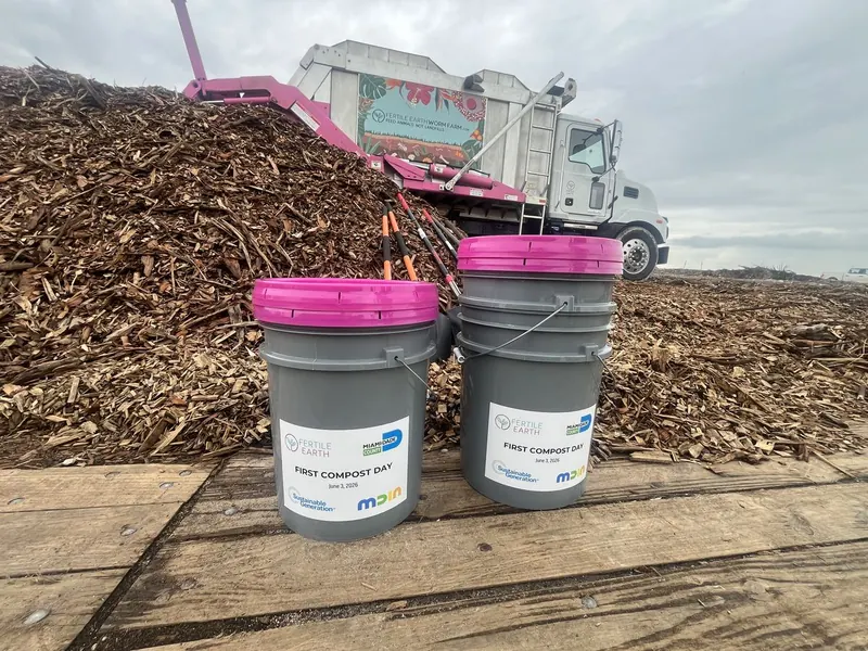 First Compost Day buckets labeled June 3, 2026 at the MDIA Composting Pilot kickoff