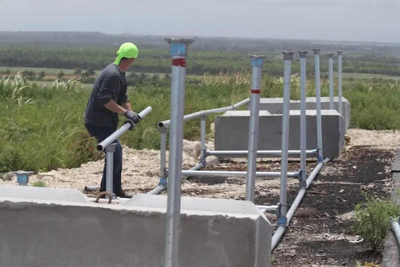 Installing the frame for the solar panel array at the pilot site