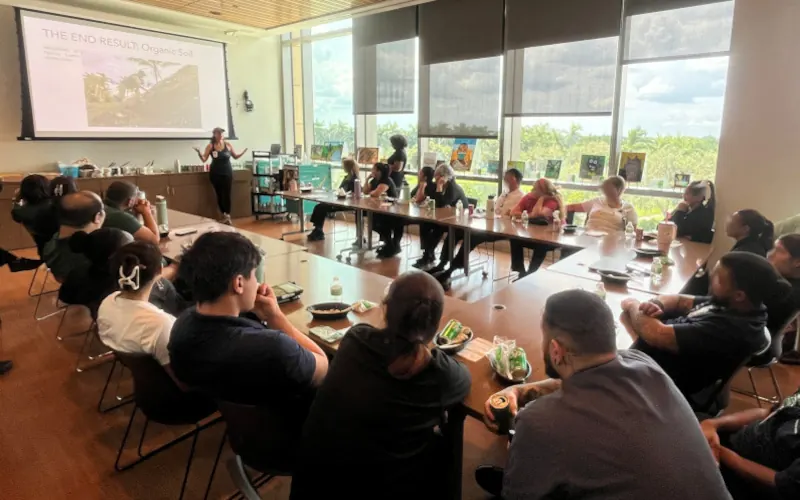 A Fertile Earth staff training session in a conference room
