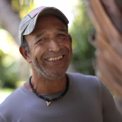 Portrait of Wolf, Farm Manager at Fertile Earth