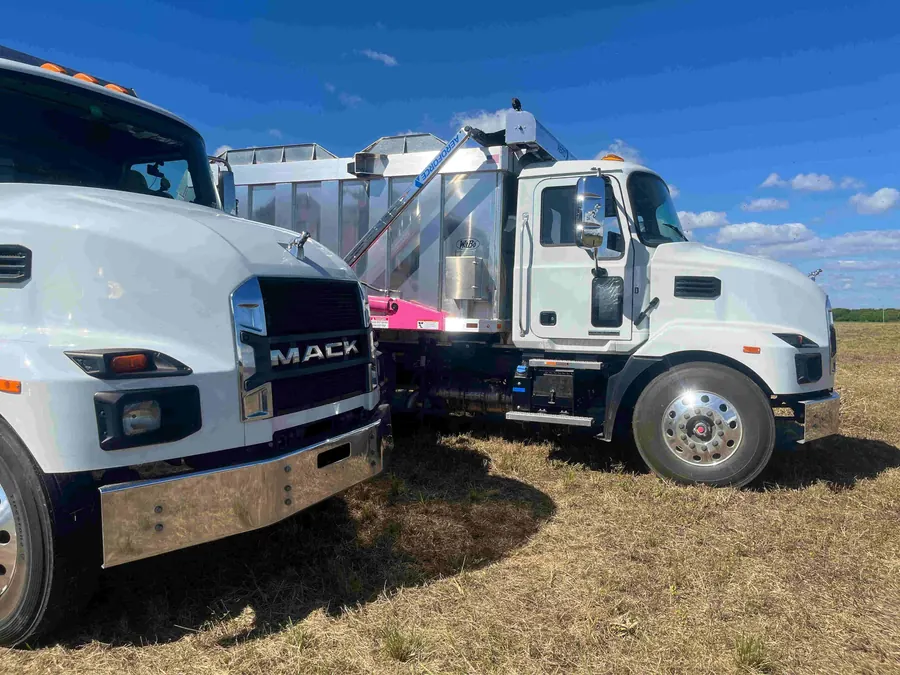 Fertile Earth collection trucks parked at the farm